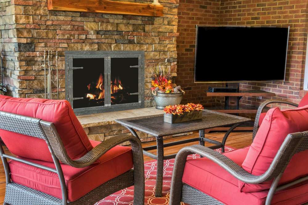 Rustic fireplaces doors by Stoll