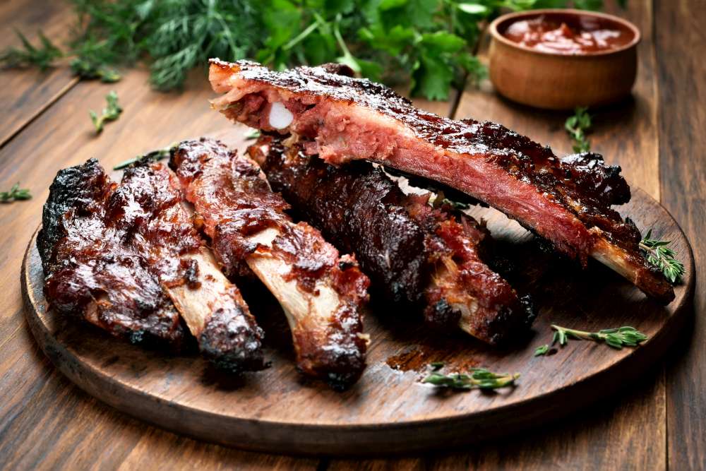 Juicy low n slow cooked BBQ Ribs with sauce. How to cook ribs low n slow on the grill?