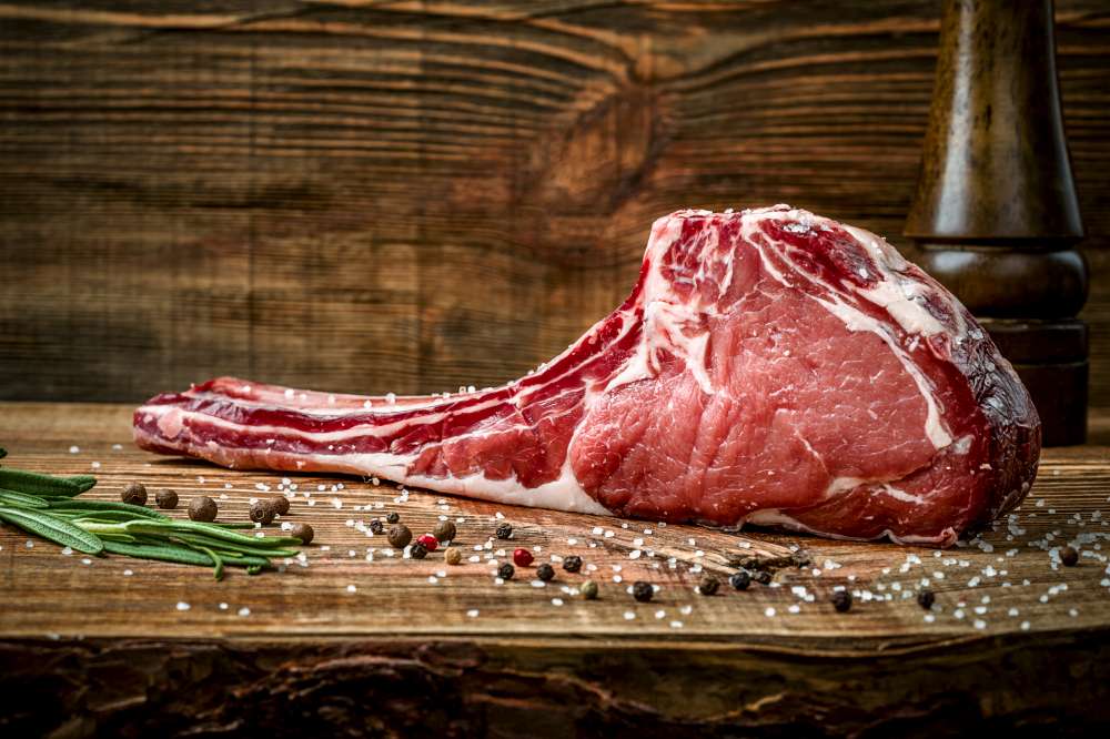 Raw Tomahawk steak ready to be perfectly cooked! How to cook the perfect Tomahawk steak?