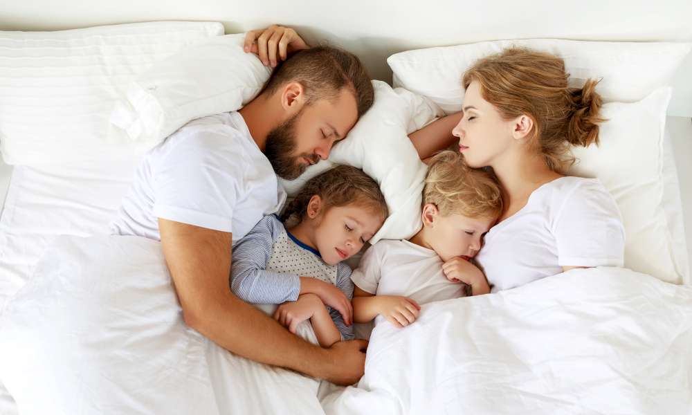 Family sleeping safely while fireplace is on. Are fireplaces safe?