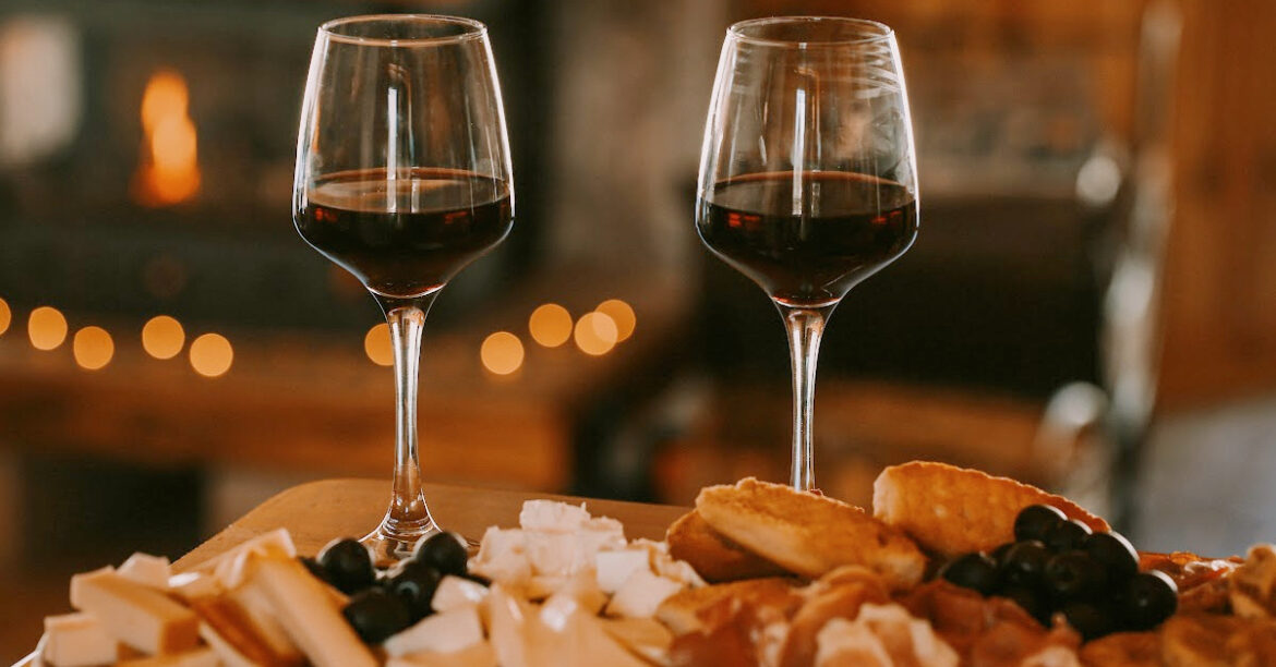 The Romance of Winter_ Date Night Ideas by the Fireplace - wine & cheese board date night by the fireplace